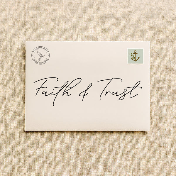 Christian faith-building letter subscription packaging with cream envelope on linen background